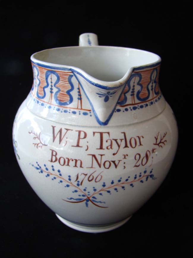 A wonderful English pottery jug circa 1800 inscribed "W P Taylor born November 28, 1766"